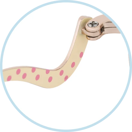 Pink polka dots on the inner side of the temples