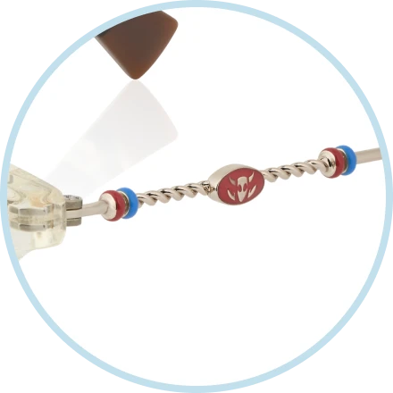 Cowgirl rope-inspired temples, accented with Jessie's signature belt buckle motifs